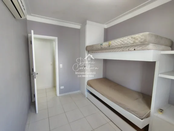 Imagem Apartamento à venda no Jardim Astúrias, Guarujá-SP: 3 quartos, 1 suíte, 2 salas, 2 banheiros, 2 vagas de garagem, 110m².