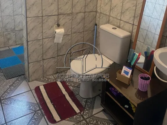 Imagem Espaçosa Casa Geminada à Venda no Tupiry, Praia Grande - 3 Quartos
