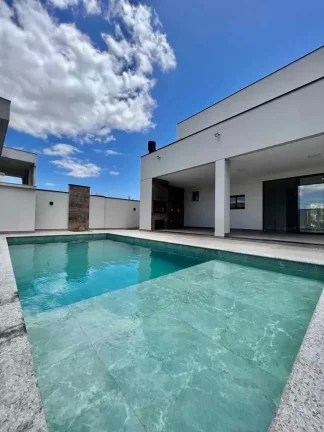 Imagem Casa em condomínio com 4 dormitórios sendo 3 suítes e 4 vagas - Camboriú/SC