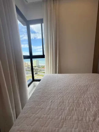 Imagem Apartamento vista mar com 2 suítes e 1 vaga de garagem em Itapema/SC