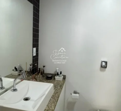 Imagem Aluguel de apartamento no Jardim Astúrias, Guarujá-SP: 2 quartos, 1 suíte, 2 salas, 2 banheiros, 1 vaga de garagem, 85m² de área.