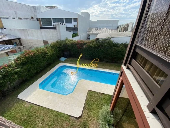Imagem Sobrado no Centro de Xangri-la com 05 dormitórios com piscina
