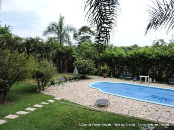 Imagem Muita privacidade com paisagismo tropical, piscina, 5 dormitórios e área gourmet completa.