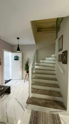 Imagem Casa com 3 suítes e 4 vagas de garagem em Balneário Camboriú/SC