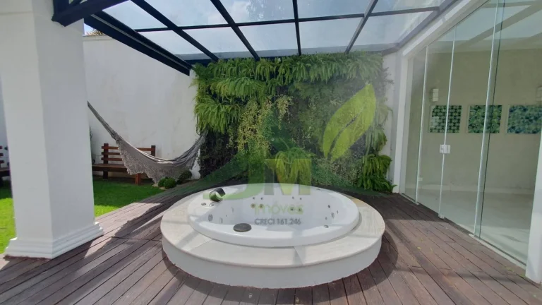 Imagem Mansão de Luxo no Condomínio Flamboyant: Exclusividade e Sofisticação em At