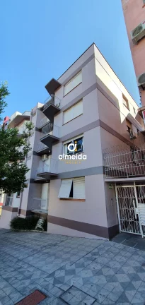 Apartamento com 2 dormitórios e dependência completa no centro