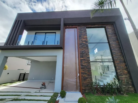 Imagem Casa de alto padrão em condomínio à venda em Camaçari-BA, 4 quartos, 4 suítes, 3 salas, 1 banheiro, 4 vagas, 267m².