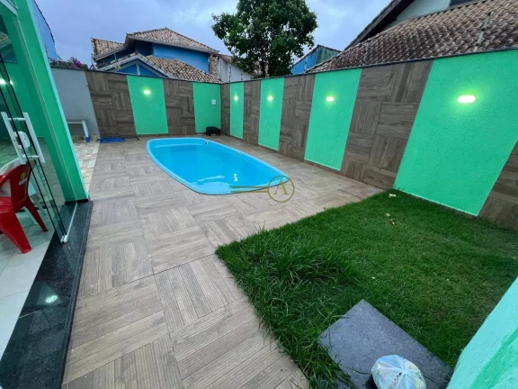 Imagem Casa novíssima térrea, 100 metros da praia, piscina e lavabo