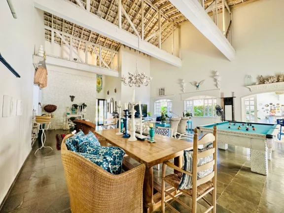 Imagem Casa de luxo à venda no Riviera de São Lourenço Módulo 22: 4 suítes, 6 vagas, 394,81m² - Oportunidade única!