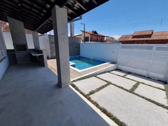 Imagem Casa reformada térrea, 100 metros da praia Piscina com cascata, luz de led