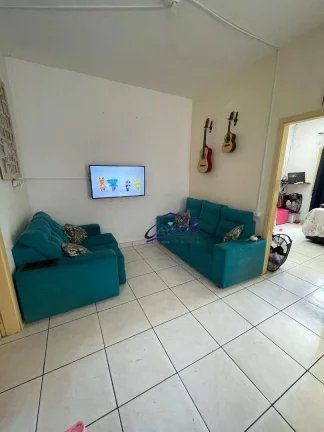 Imagem Casa com 2 dormitórios à venda, 95 m² por R$ 390.000,00 - Caiçara - Praia Grande/SP