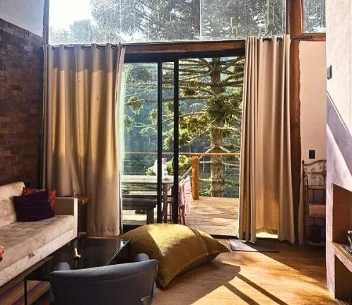 Imagem Studio Loft em Gonçalves: Design, Silêncio e Vista Privilegiada