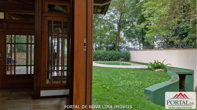 Imagem Casa a venda no condomínio Ipê da Serra, casa com armário e área de lazer com piscina. Venha conhecer no Portal de Nova Lima Imóveis - 31.98511-8000