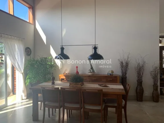 Imagem Casa térrea com sala de estar, sala de tv, lavabo, sala de jantar integrada à cozinha planejada e ...
