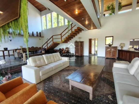 Imagem Espetacular Casa em Condomínio do Guarujá-SP - 4 Quartos, 4 Suítes, 5 Salas, 6 Vagas, 631,64m².