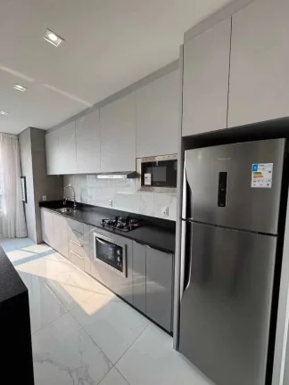 Imagem Apartamento mobiliado com 2 suítes e 2 vagas de garagem em Balneário Perequê