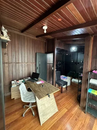 Imagem Casa com 3 dormitórios sendo 1 suíte e 2 vagas de garagem em Itapema/SC