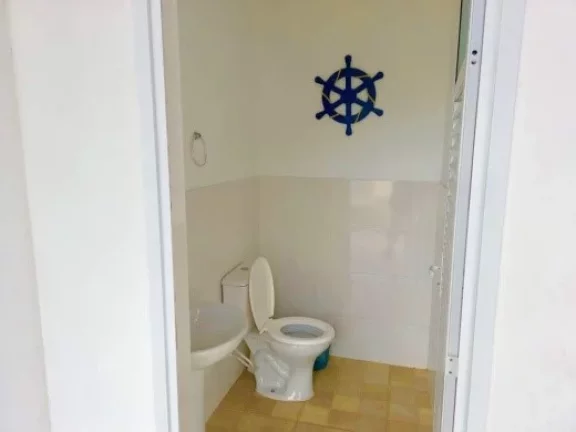 Imagem Casa à venda em Ubatuba-SP, bairro Toninhas: 3 quartos, 1 suíte, 1 sala, 2 banheiros, 108m² de área. Confira já!