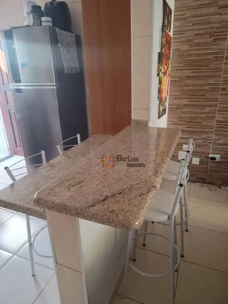 Imagem Sobrado com 2 dormitórios à venda, 79 m² por R$ 318.000 - Oceanópolis - Mongaguá/SP
