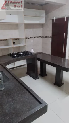Imagem Casa à venda em Praia Grande-SP, bairro Ocian: 2 quartos, 1 sala, 1 banheiro, 2 vagas, 150m². Imperdível oportunidade!