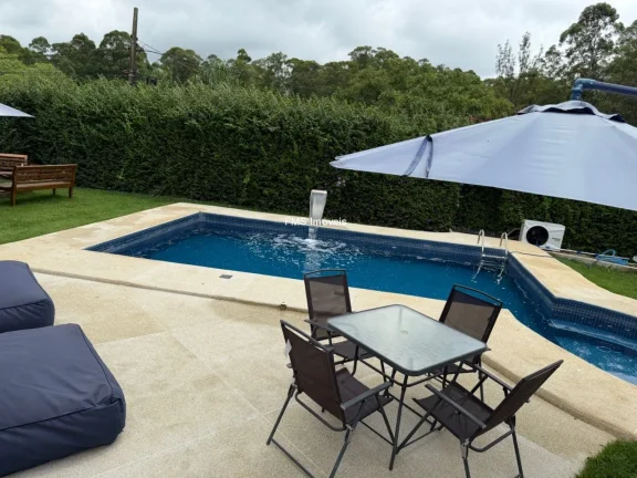 Imagem Oportunidade única: Casa de condomínio de alto padrão com 3 suítes e 4 vagas no Ninho Verde I, Porangaba-SP!