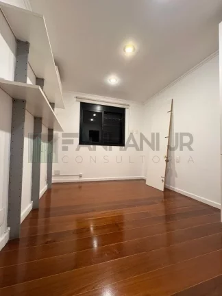 Imagem Apartamento de luxo no coração de São Paulo: 3 quartos, 3 suítes, 3 salas, 5 banheiros, 3 vagas de garagem, 170m² no Itaim Bibi.
