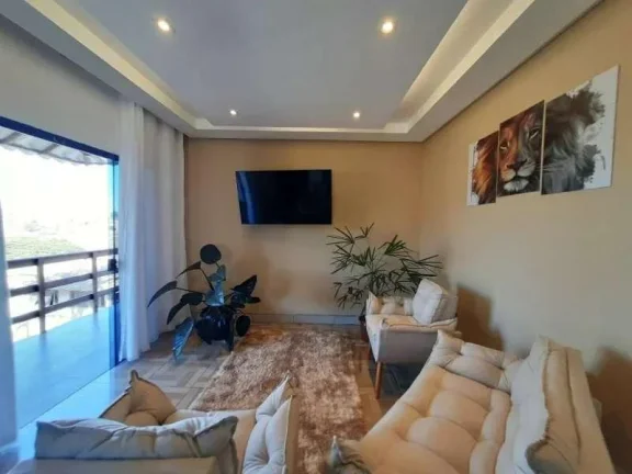 Imagem Elegante Casa com Área de Lazer, Três Dormitórios e Suítes