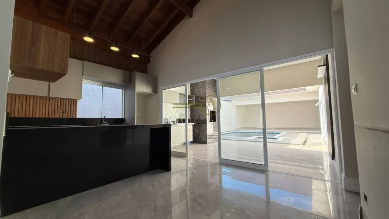 Imagem Casa térrea 3 suítes no condomínio bosque três marias com piscina e varanda