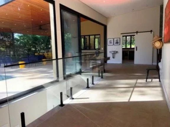 Imagem Casa de Condomínio com 5 Quartos e 6 banheiros, 405 m².