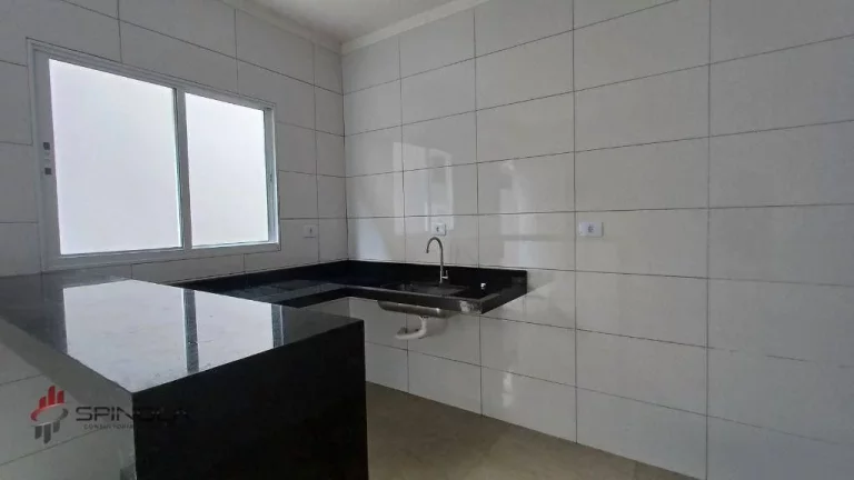 Imagem Casa com 2 dormitórios à venda, 70 m² por R$ 450.000,00 - tude basto - Praia Grande/SP