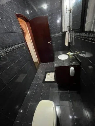 Imagem Sobrado 243 m² 3 Dormitorios sendo 2 Suites 3 Vagas de Garagens