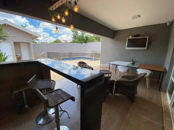 Imagem Casa à venda, com sala de estar e jantar integradas à área gourmet, piscina e terreno espaçoso. ...
