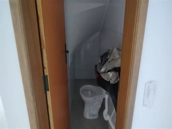 Imagem Sobrado com 2 dormitórios à venda, 77 m² por R$ 350.000,00 - Caiçara - Praia Grande/SP