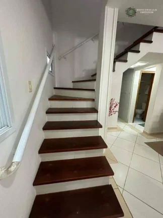Imagem Sobrado com 3 dormitórios à venda, 125 m² por R$ 650.000 - Caiçara - Praia Grande/SP