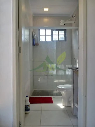 Imagem Bela Casa casa em Terra Preta com área comercial à venda