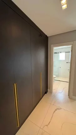 Imagem Apartamento com 4 suítes e 3 vagas de garagem em Meia Praia - Itapema/SC