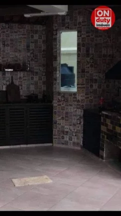 Imagem Belissímo Sobrado com 3 dormitórios à venda, 500 m² por R$ 2.850.000 - Jardim Virginia - Guarujá/SP