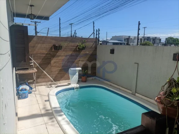Imagem Sobrado á venda com 3 dormitórios na Stan em Torres/RS