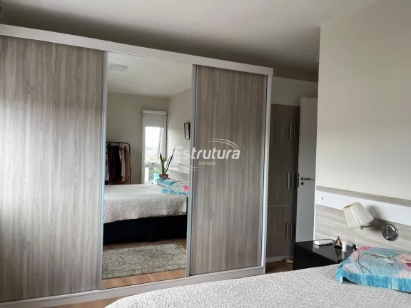 Apartamento 2 dormitórios com suíte e garagem no centro