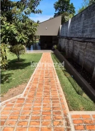 Imagem Sobrado de alto padrão em Cambé: 3 suítes, piscina aquecida, casa de visitas, pomar, energia solar e 3.000m² de terreno amplo