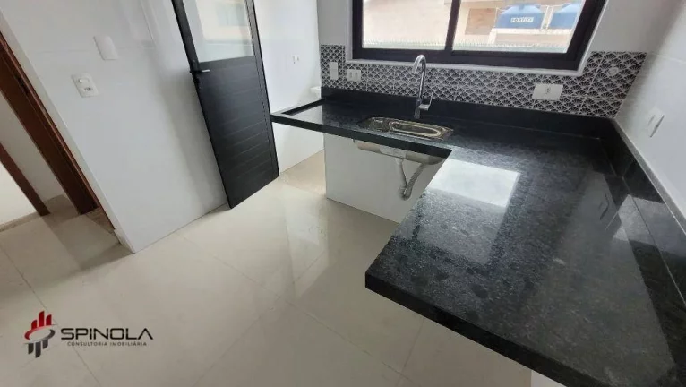Imagem Casa com 2 dormitórios à venda, 54 m² por R$ 330.000,00 - Vila Caiçara - Praia Grande/SP