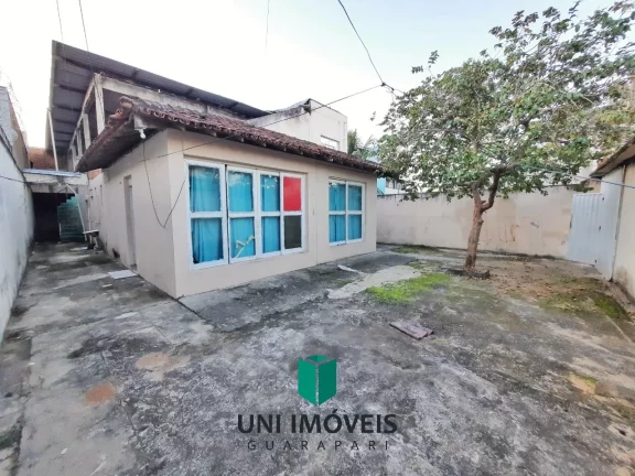 Imagem Terreno de 360M² com casa a venda por R$500.000 na Praia do Morro em Guarapari.