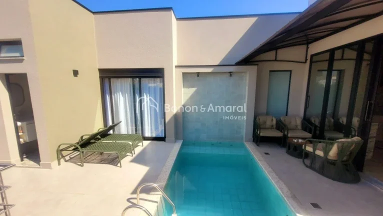 Imagem Esta casa térrea no Swiss Park em Campias, SP, impressiona com seus 230m² de área construída.

S...