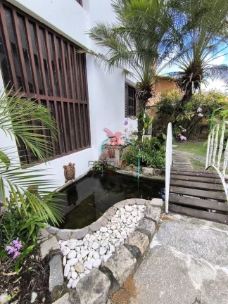 Imagem Linda casa com Jardim, 4 quartos , sendo 3 Suites , 4 Vagas, no Bairro Capim Macio, Natal
