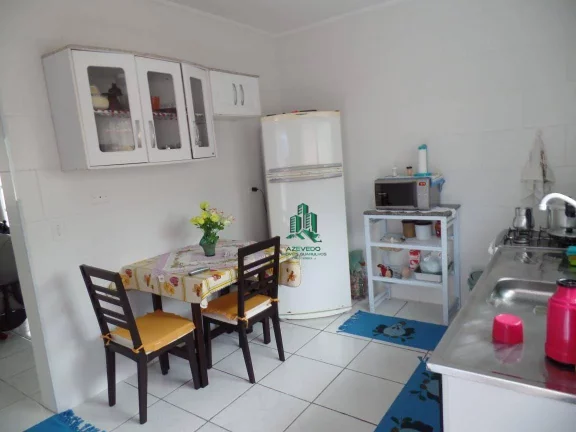 Imagem Sobrado com 2 dormitórios à venda, 77 m² por R$ 320.000,00 - Balneário Itaguaí - Mongaguá/SP