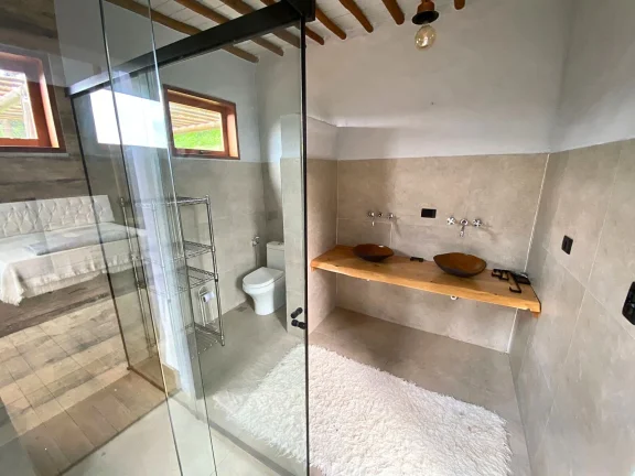 Imagem Studio Loft em Gonçalves: Design, Silêncio e Vista Privilegiada