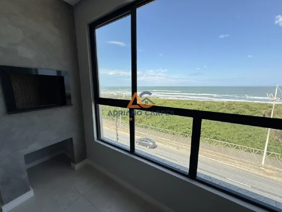Imagem Apartamento novo, frente mar com 87m², 2 suítes e churrasqueira a carvão na Meia Praia - Navegantes Adriano Carpes Imóveis vende!
