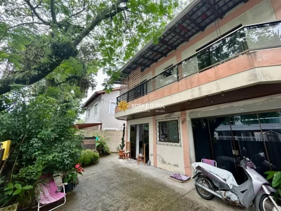 Imagem Terreno de quadra com 2 casas à venda Bombas Bombinhas SC