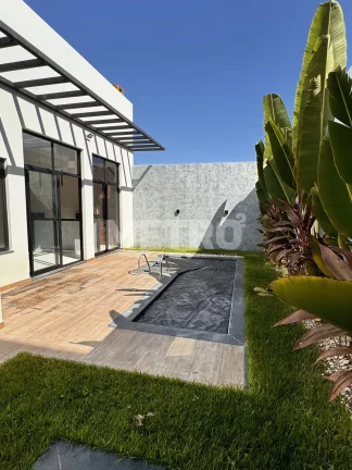 Imagem Casa à venda no Alphaville com três suítes, gourmet com piscina e churrasqueira