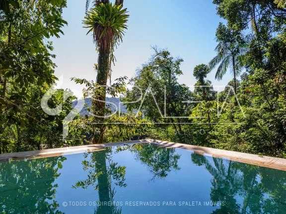 Imagem Magnífica mansão totalmente mobiliada à venda no condomínio Sítio São Pedro no Guarujá